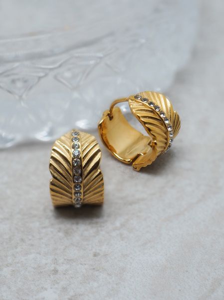 Hovedbilde Øredobber med bladformet i stål gullfarget