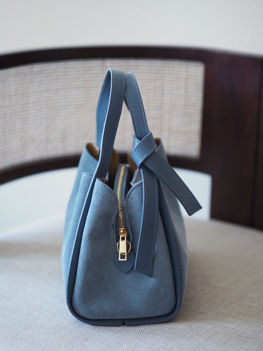 Semsket skinnveske lyseblå