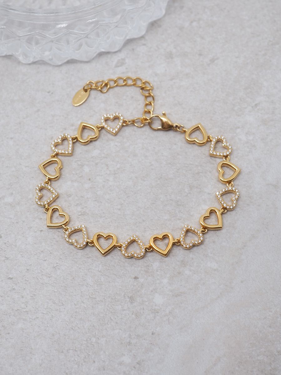 Hjertearmbånd i stål gullfarget