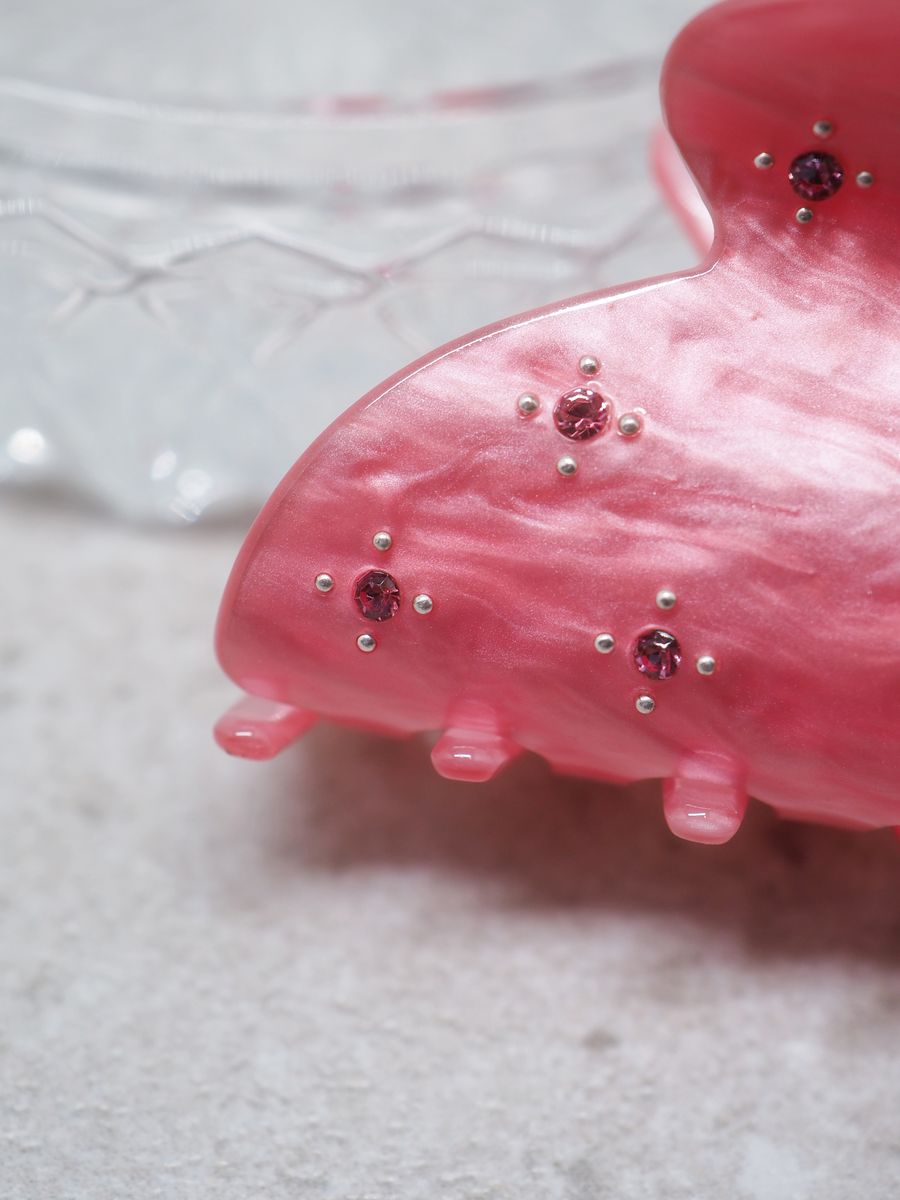 Hårklype med små perleblomster fuksia