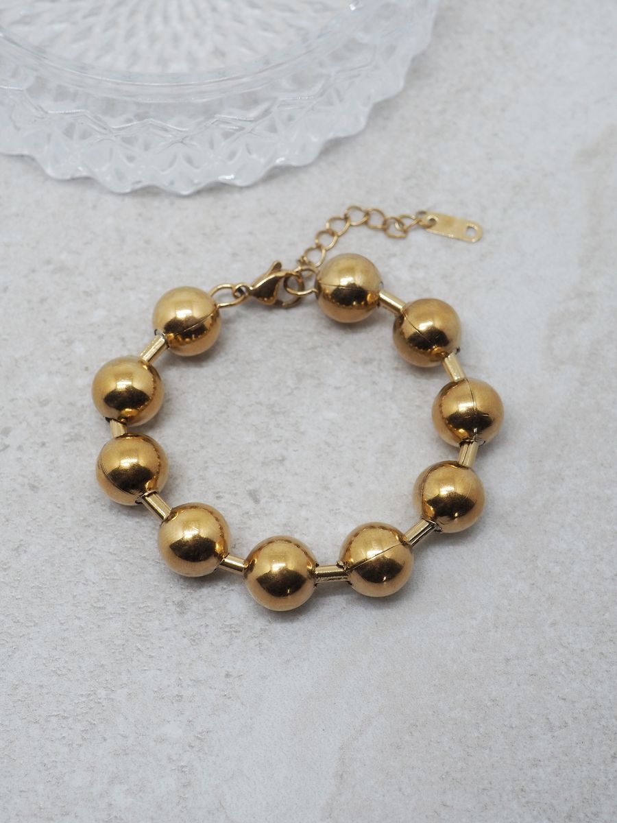 7DAYS armbånd gullkuler stål gullfarget