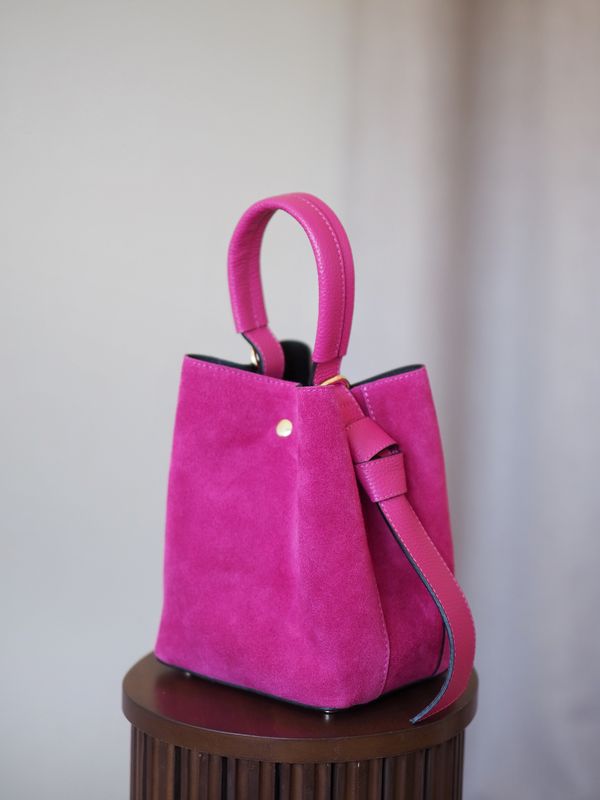 Bøtteveske semsket skinn fuxia
